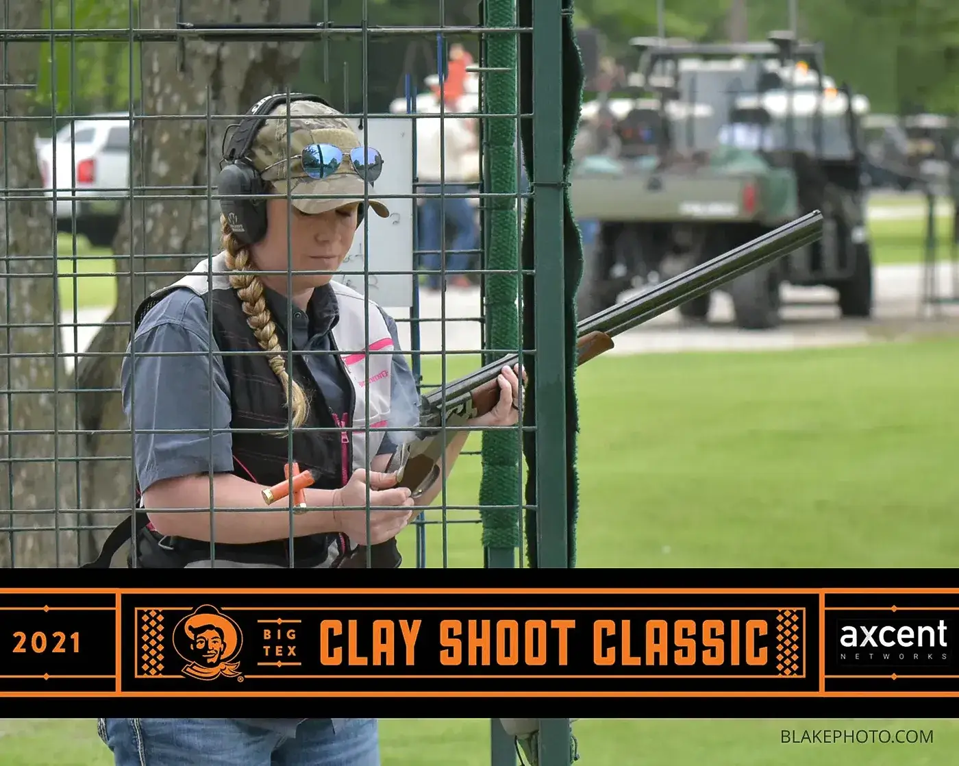 Clay shoot action photograph captured during tournament competition.