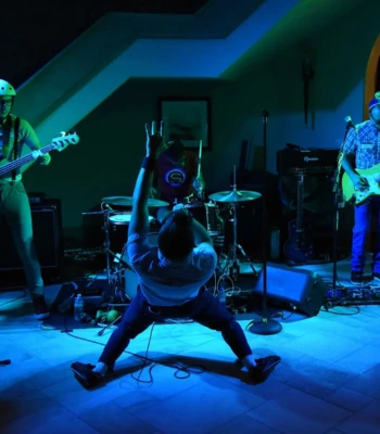Live band performing for guests at an indoor event in Dallas Ft Worth