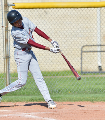 Baseball batter swinging in Dallas Ft Worth by Blake Photography