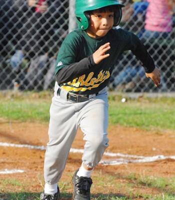 Baseball batter swinging in Dallas Ft Worth by Blake Photography