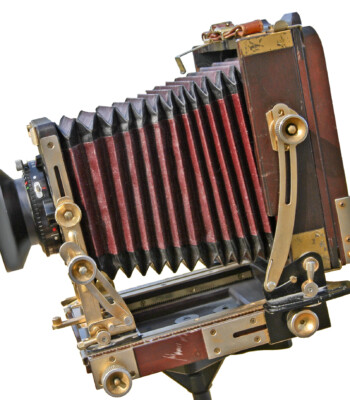 Isolated photograph of Graflex view camera.