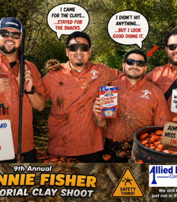 `Four clay shoot participants joking about their scores at the 9th Annual Ronnie Fisher Memorial Clay Shoot`